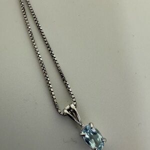 Silver necklace with blue setting